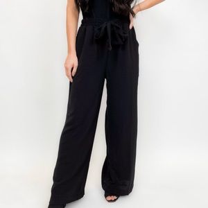 BRAND NEW NEVER WORN WHITE BIRCH BLACK PANTS IN SIZE MEDIUM